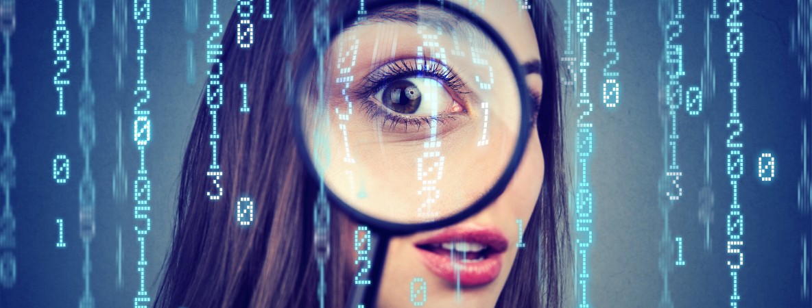 Investigation-surveillance-of-cyber-crime-concept.-Curious-woman-looking-through-a-magnifying-glass-