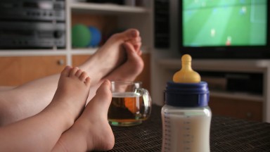 A-man-and-his-baby-son-watching-football-92118070_3050x2303.jpeg