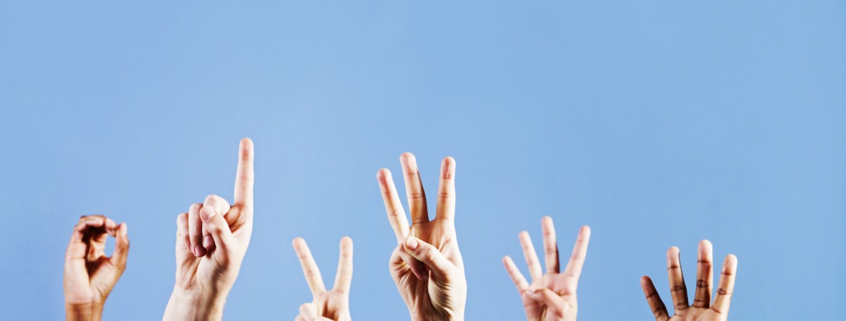 Six-hands-count-from-0-to-5-against-blue-background-168252971_2122x1415.jpeg