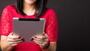 Resized2_Woman-reading-something-on-tablet-504859910_5472x3648.jpg