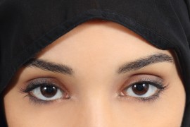 Resized_Arab-saudi-emirates-woman-with-plump-red-lips-make-up-484016273_3277x4915.jpg