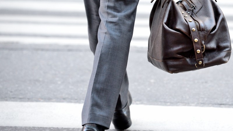Resized2_Man-in-suit-with-bag,-on-zebra-crossing-531594755_3000x1997.jpg