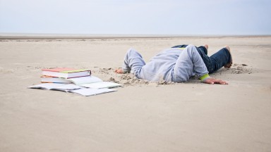 Overstrained-child-stucks-head-in-sand-168729460_2128x1413.jpeg