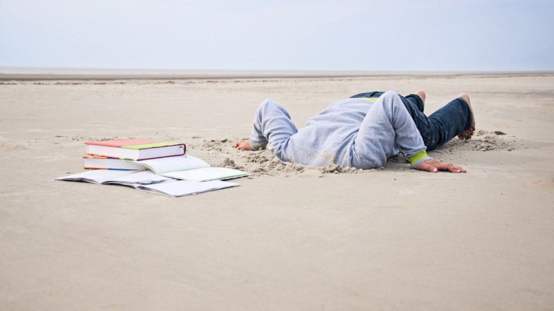 Overstrained-child-stucks-head-in-sand-168729460_2128x1413.jpeg