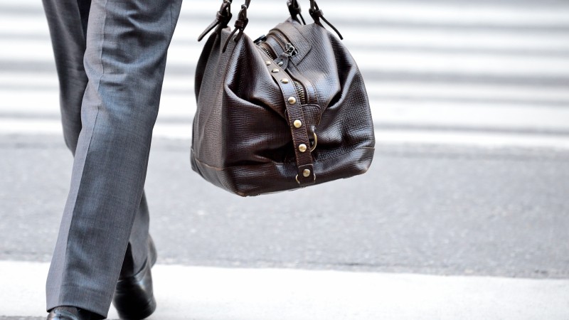 Resized_Man-in-suit-with-bag,-on-zebra-crossing-531594755_3000x1997.jpg