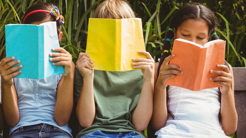 Resized2_Children-reading-books-at-park-474967010_3869x2579.jpg