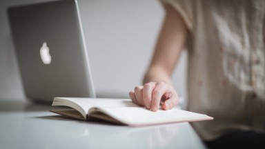 woman-reading-notes_4460x4460.jpg